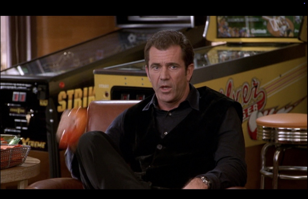 Feeling unprepared, Nick shows panic in a medium shot that frames the two pinball machines behind him. A continuity issue: The Silver Slugger’s lights are off.